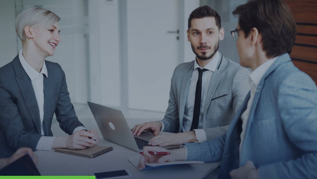 Business professionals discussing options in a meeting